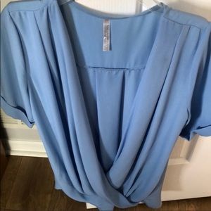 Baby blue short sleeve blouse.. brand new!!